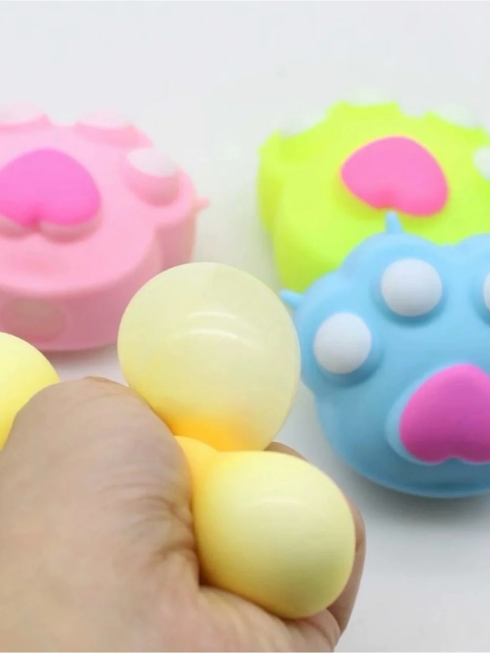 Squishy's Neon Paw Pop - Purple & Yellow Fidget Toy by